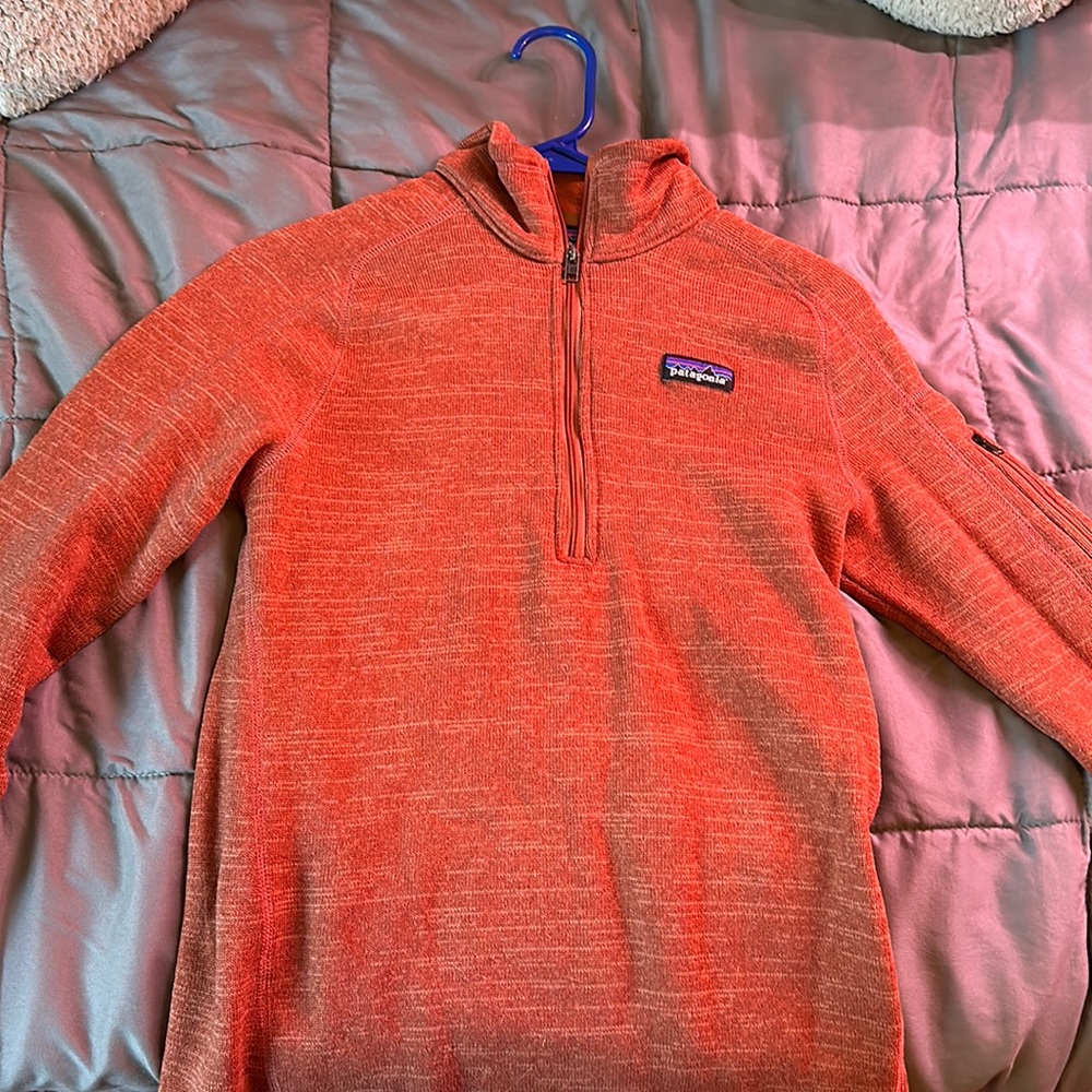 Patagonia Quarter Zip, size women’s small, color is orangish red